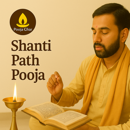 Man performing Shanti Pooja with candles and sacred text for peace and harmony